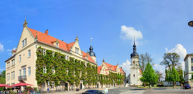 "Riesa Rathaus Pano" by Radler59 - Own work. Licensed under CC BY-SA 3.0 via Wikimedia Commons - https://commons.wikimedia.org/wiki/File:Riesa_Rathaus_Pano.jpg#/media/File:Riesa_Rathaus_Pano.jpg